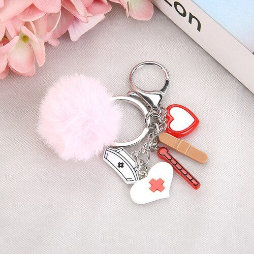 Porte clé coeur avec boule bouffante