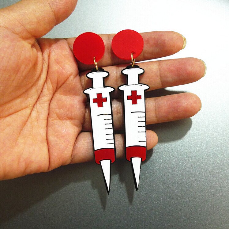 Boucles d'oreilles seringues 